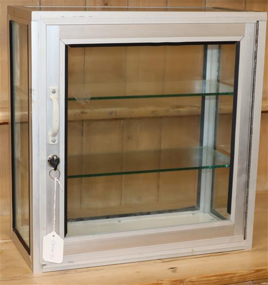 An aluminium and glass table-top display cabinet W.43cm